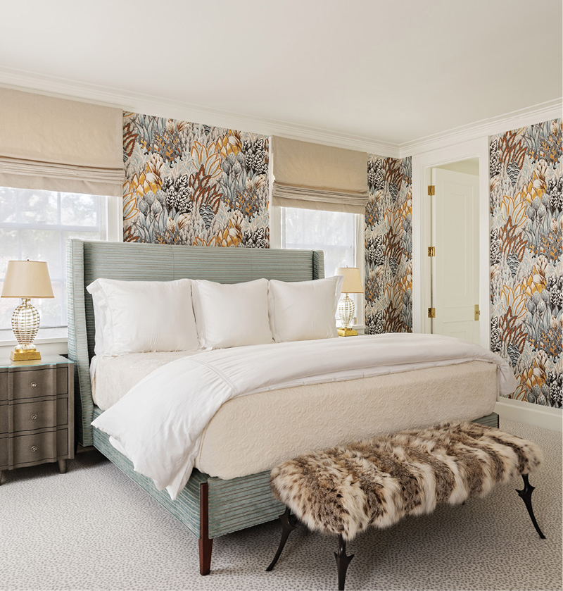 A fur-covered Sabot ottoman from Formations continues the animal theme, while the bed’s pale green fabric from Osborne &amp; Little softens the effect.