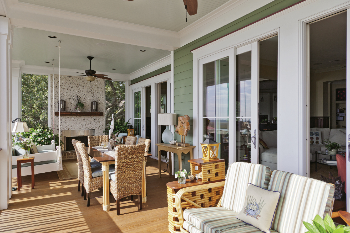 local builder Carl Derick crafted the couple’s porch dining table, and the chairs were purchased from Steinmart.