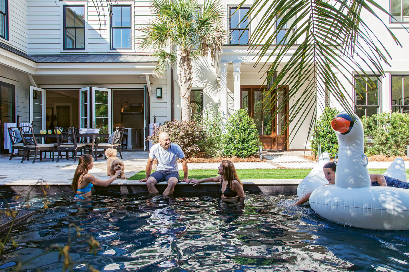 Center Court: A wall of French doors open the kitchen out to the pool and courtyard, where the Cuocos enjoy alfresco meals, thanks to Frank’s culinary prowess