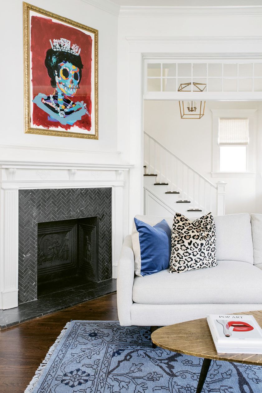 An original painting by Bradley Theodore is the crown jewel of the room.