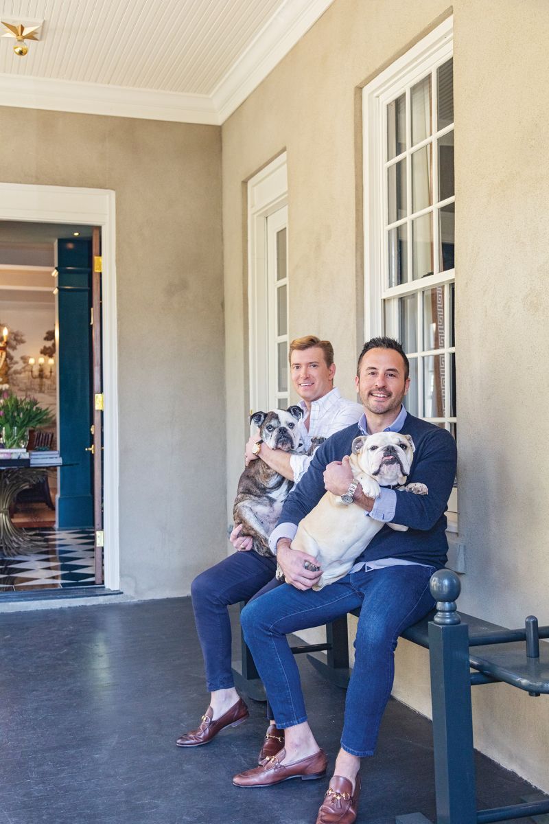 John and Will on the piazza with their English bulldogs, Lady and Trisha.