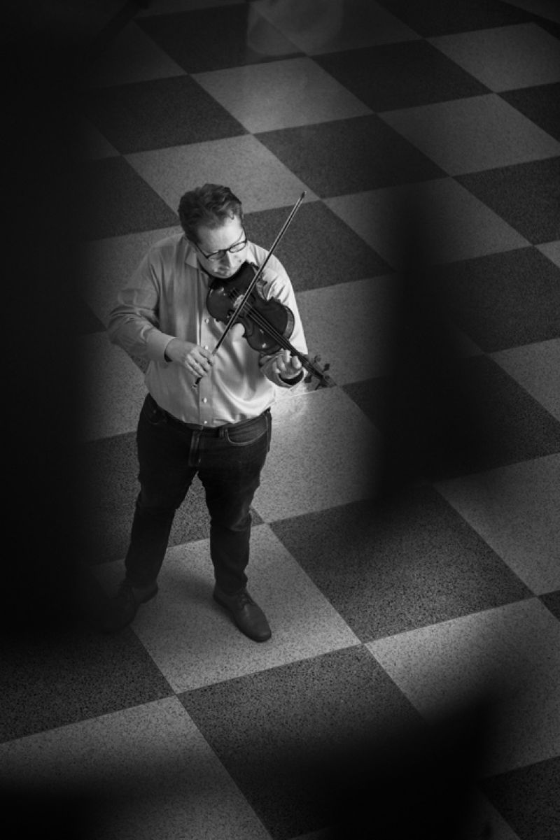 Playing the “ex-Degen” Andrea Guarneri in the Gaillard Center lobby; “Early on, while playing the violin as concertmaster... it felt like a Ferrari,” wrote Bekker about the instrument in The Strad magazine. “Having played this instrument for nearly four years now, I feel very fortunate... this has enabled me to become a better player. I never expected this level of growth in my early 40s, and it is a great blessing.”