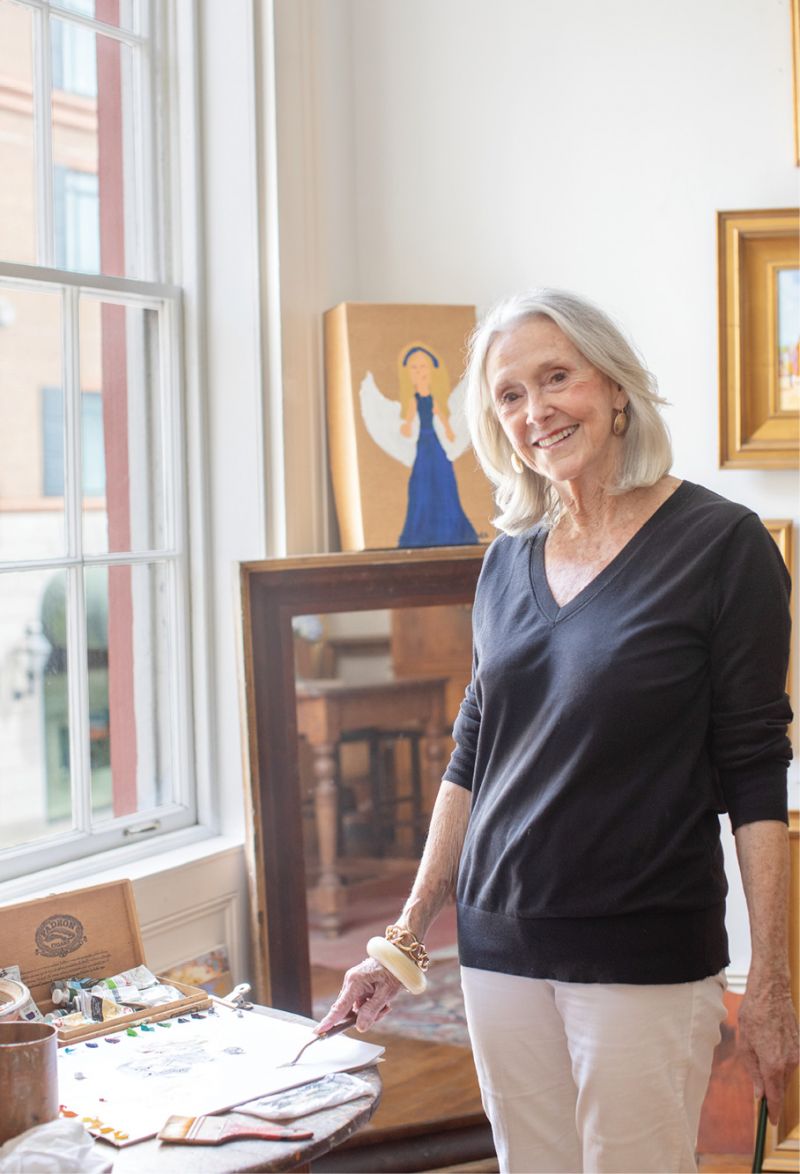 Her cousin’s daughter painted the naive angel on a cardboard box (right) when she was eight; it conveys a positive spirit over the room.