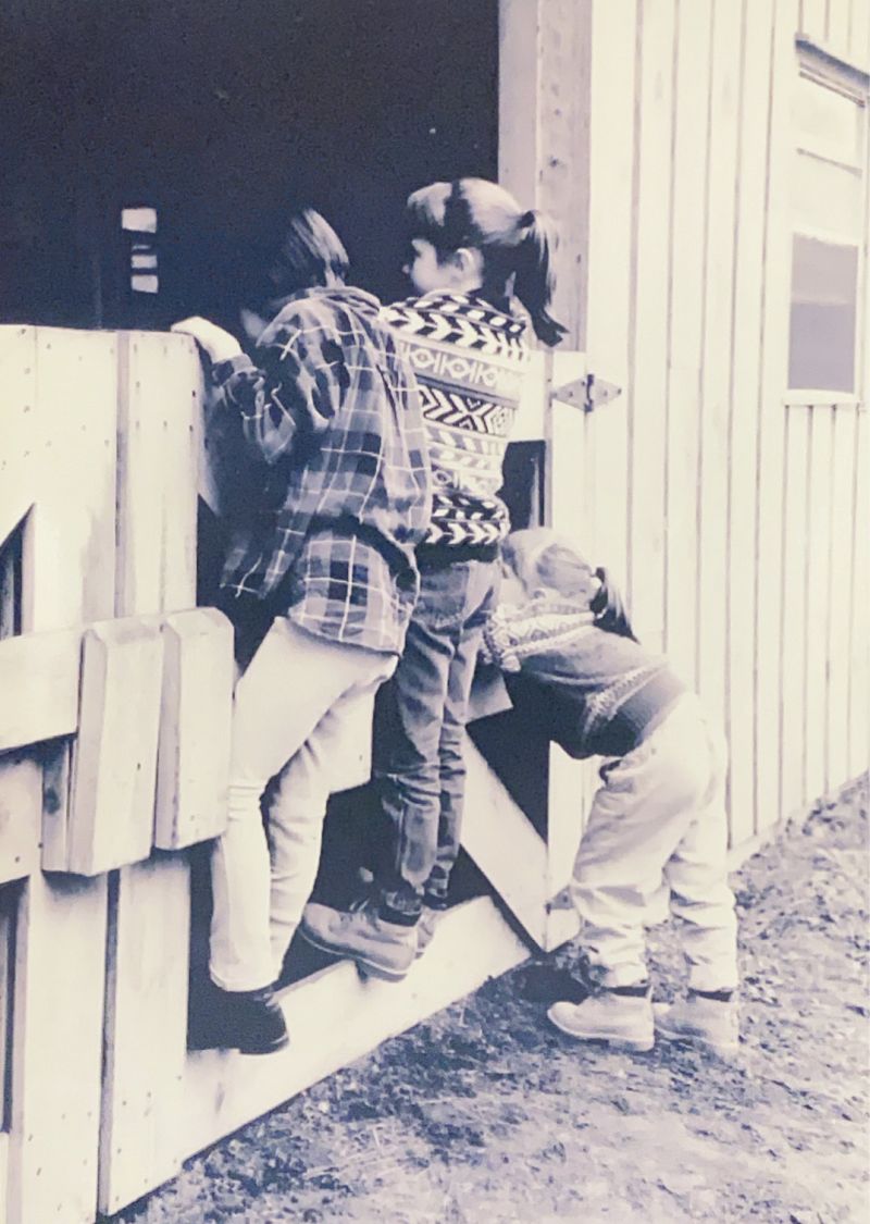 Donnelley with sister Aidan and cousin Mimi Wheeler, checking out the horses, circa 1986.