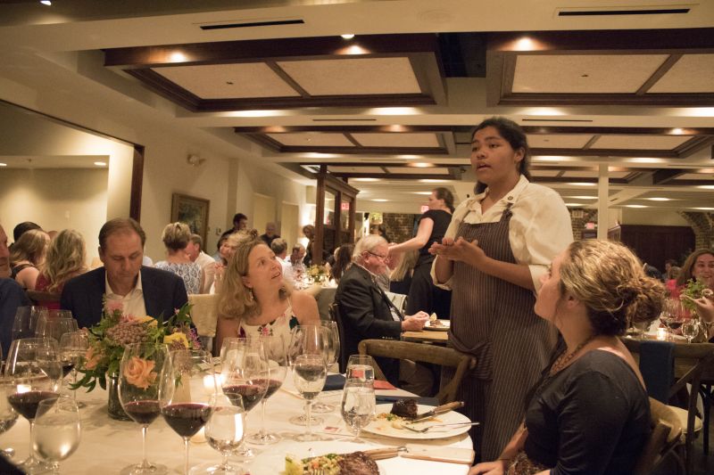 Olivia Bischoff explains her dish to guests Richard and Pam Hricik and Sara Porter.