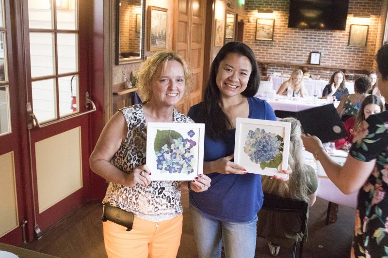 Ann Marie Keck and Vanessa White show off their designs.