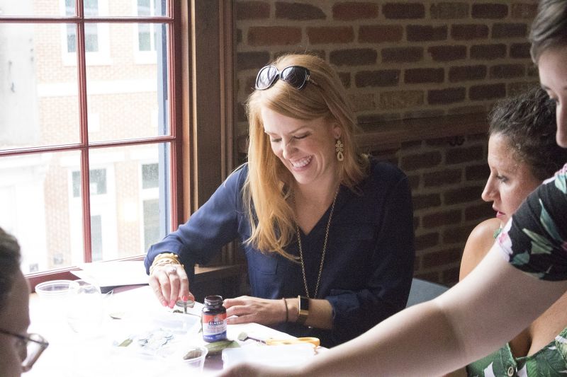 Meredith Siemens jokes with her table mates