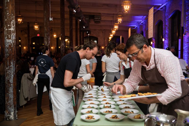 Jill Mathias of Chez Nous and Kevin Johnson of The Grocery prepare their first course.