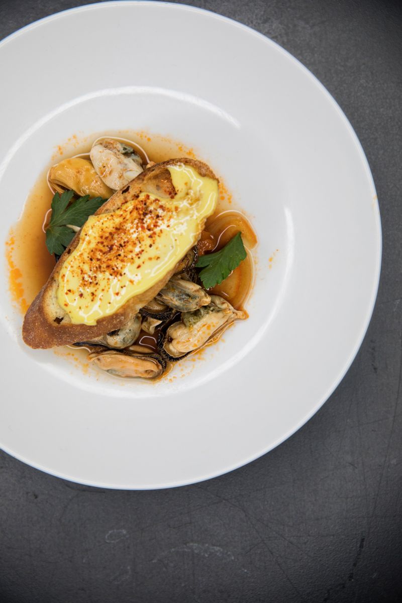 Mussels en Escabeche on crispy toast by Jill Mathias.