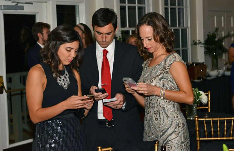 Guests texted their bids to a special number set up for the silent auction.