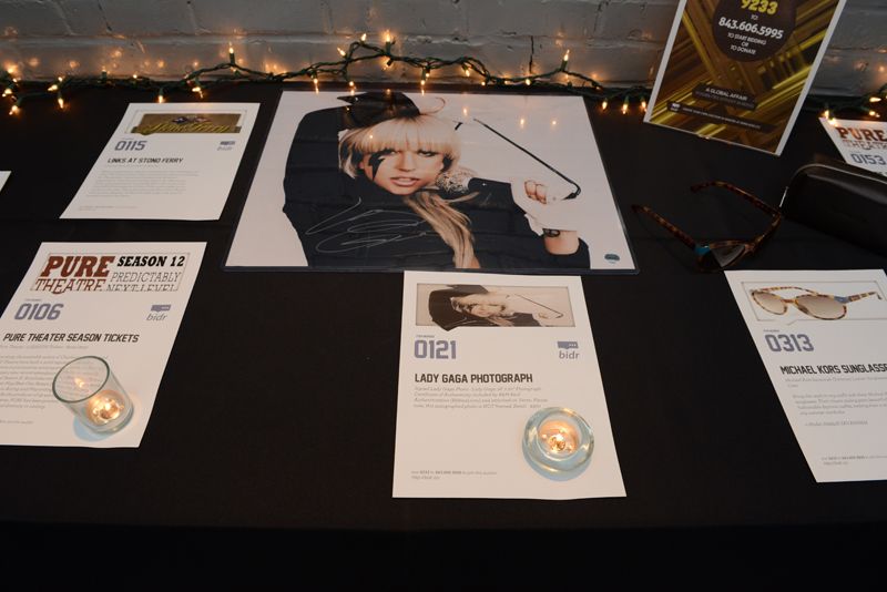 Party-goers could also bid on Pure Theater tickets, a Lady Gaga photograph, or Michael Kors sunglasses.