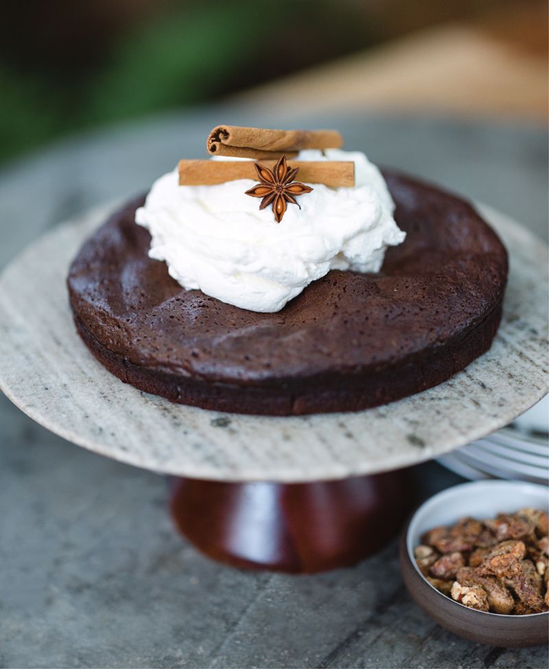 Lexie ordered the decadent flourless chocolate cake topped with chai Chantilly cream from Flying Tricycle bakery.