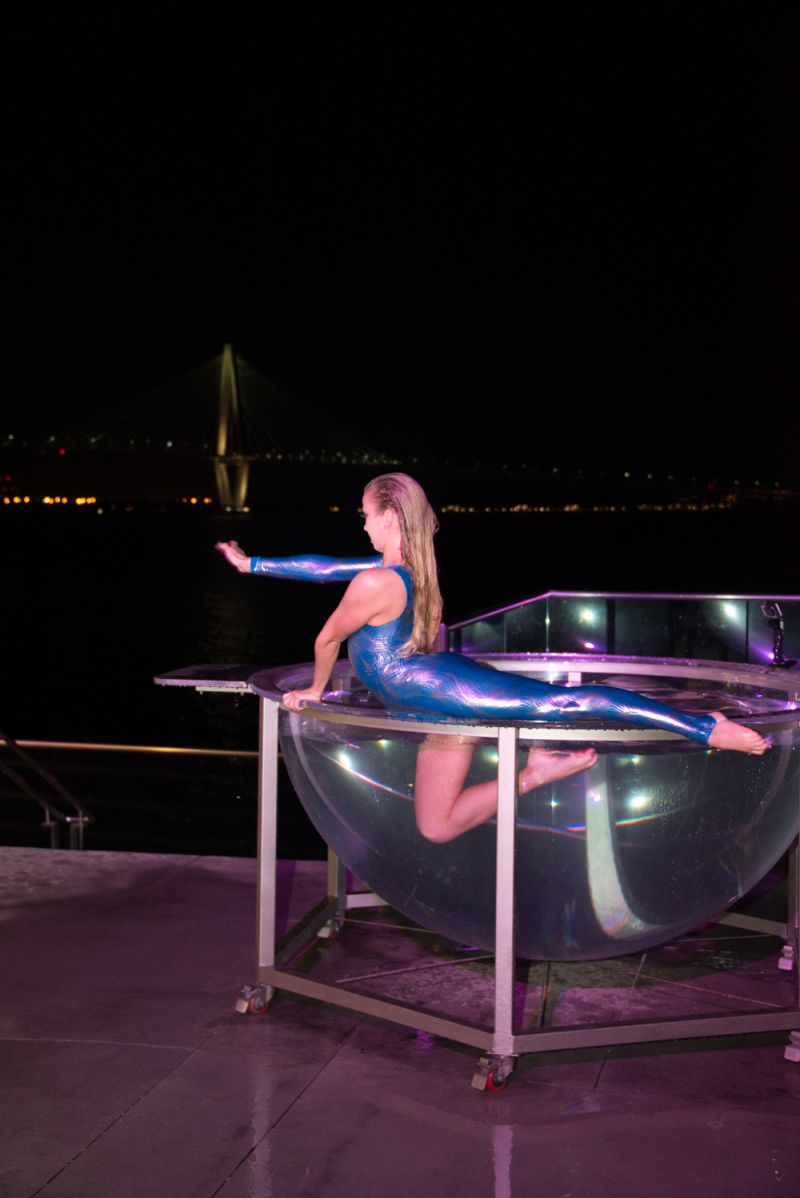 The water bowl performer impressed guests with her fish-like movements.