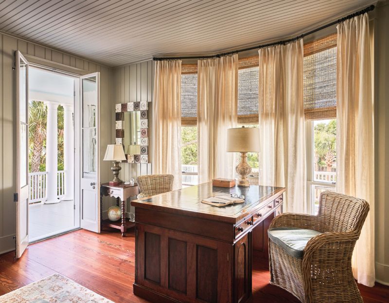 The couple’s office was formerly their primary bedroom suite; it now holds David’s antique partners desk.