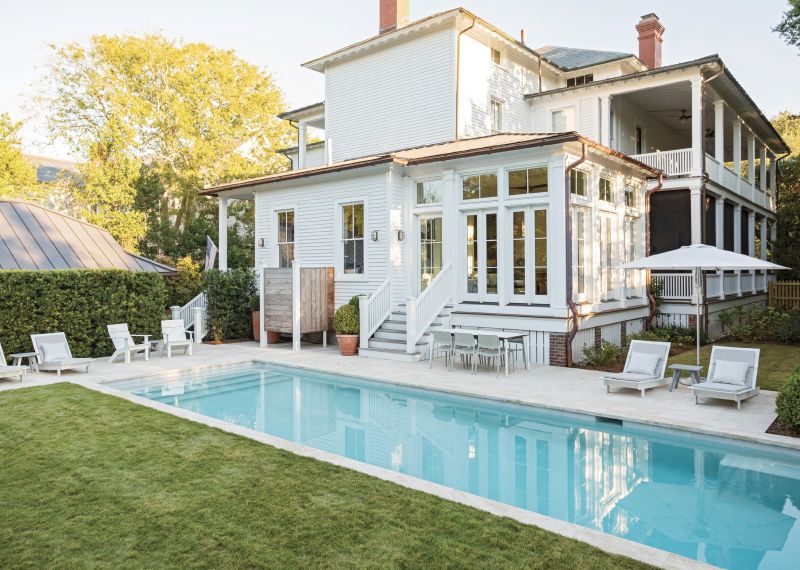 Fit Right in: This view shows the extent of the addition to the rear of the house. Architect Beau Clowney worked to make the contemporary sun-room fit into the overall historical character of the home. The swimming pool was also redone to be more compact and allow space for a lawn.