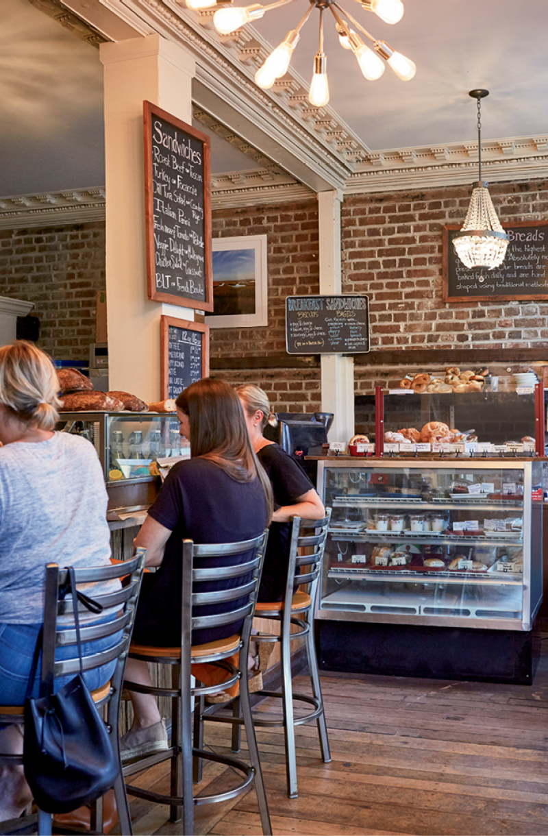 Guests gather in the cozy interior space.