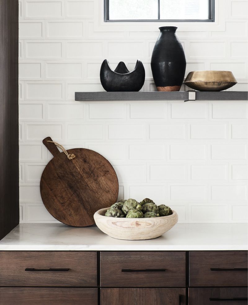 Custom dimensional concrete tile provides subtle interest in the kitchen. “The tile is one of my very favorite things in the house,” says Rebecca.