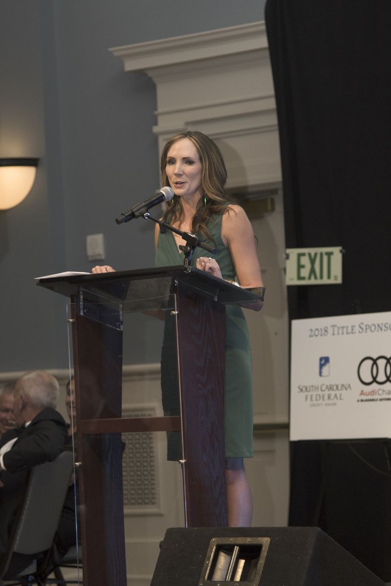 Emcee and auctioneer Erin Kienzle commands the mic.