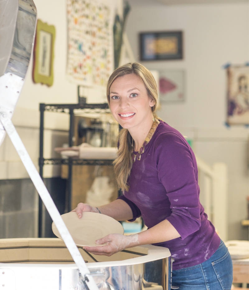 Grace Jennings at work in her studio; see more of her work at <a href="http://www.graceyourtable.com">www.graceyourtable.com</a>.