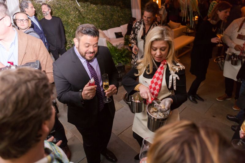 Man Vs. Food Host Adam Richman with Lydia Mondavi