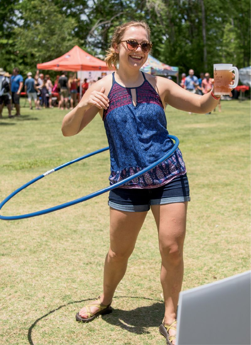 Balancing a mug of beer while hula-hooping during the hula-hooping competition was no easy feat.
