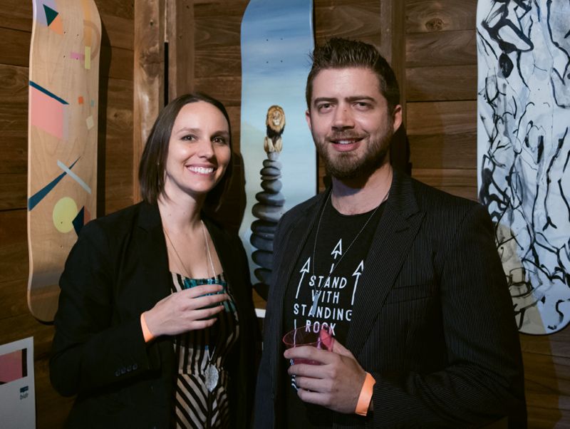 Megan and Robert Lange flank their design.
