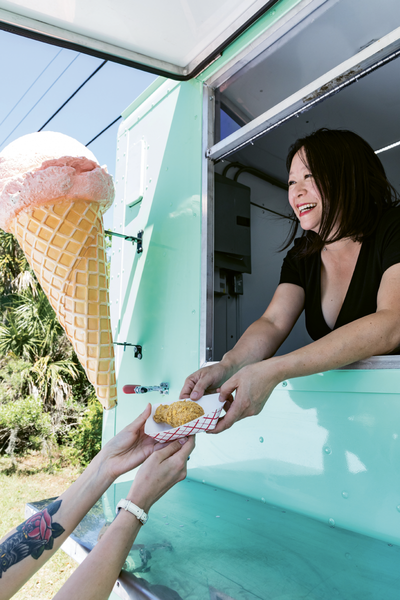 “We make everything but the sprinkles,” says Wong. Wong serves a Not Fried Chicken.