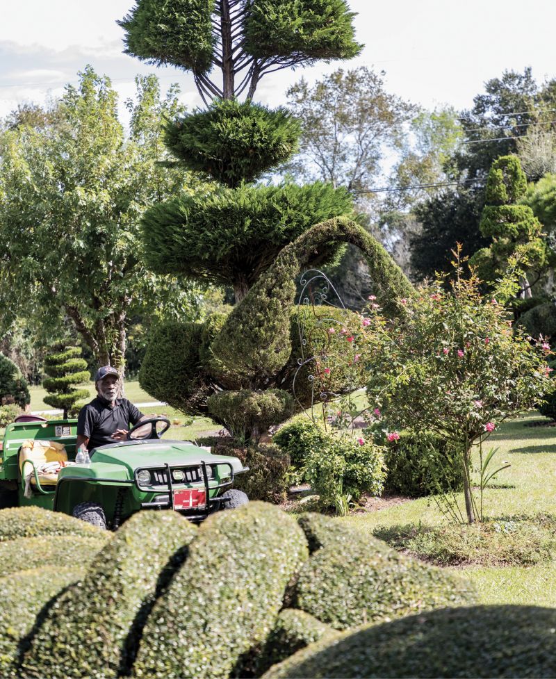 CRUISE CONTROL: Fryar, age 79, makes daily rounds in his utility vehicle and was once featured in a John Deere commercial. He says, “Success takes hard work, passion, and marketing.”