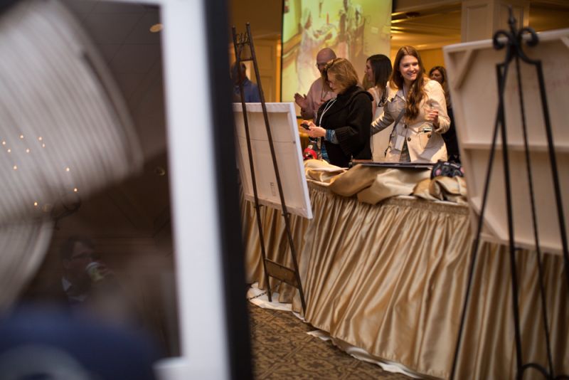 Guests chose their favorite silent auction items.