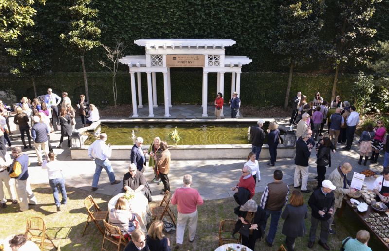 Guests snacked at tables set up in the courtyard.