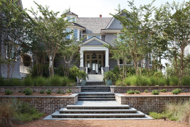 HOME AWAY FROM HOME: This grand Kiawah manse, nestled along the ocean at the far end of the barrier island, occupies a little over three acres of lush maritime forest.