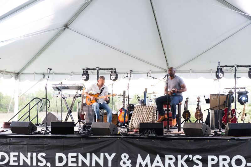 Eric Penrod and Tim Davis of duo One Kool Blow warm up the crowd