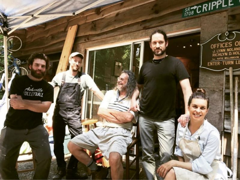 The Haywood Street Fresco crew includes (left to right) Anselme Long, Caleb Clark, John Dempsey, and fresco creator and principal artist Christopher Holt