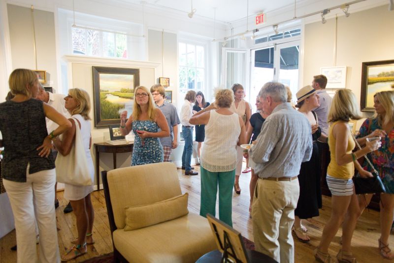 Guests mingled and conversed as to their favorite pieces in each gallery.