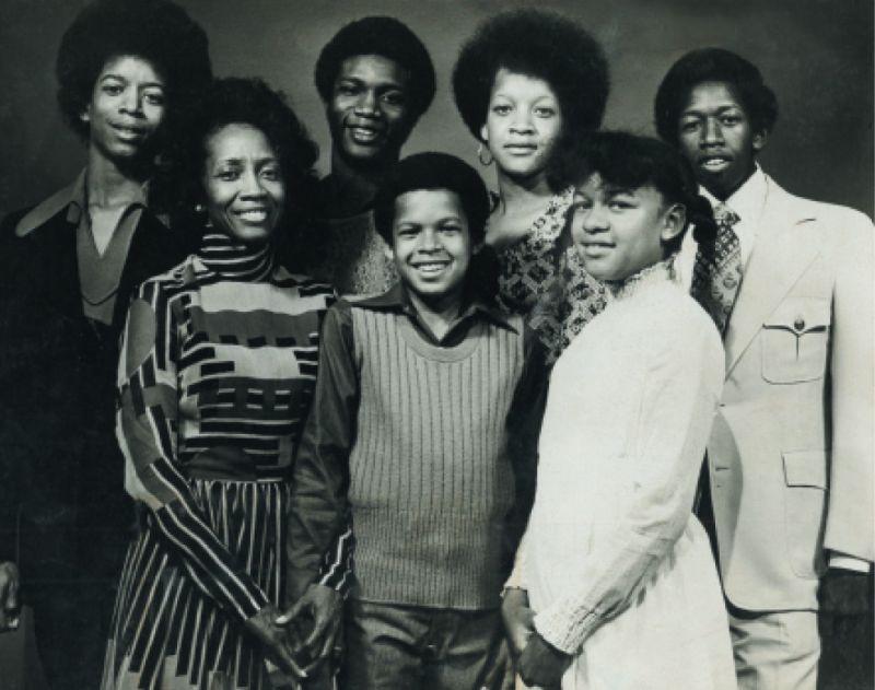A proud mom with her six children (left to right) Ralph, Stanley, Darryl, Adrian, Jami, and Gerald