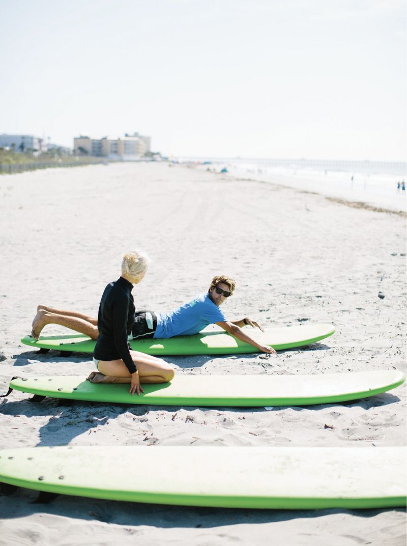 Learning how to paddle before hitting the water at Isla Surf School.