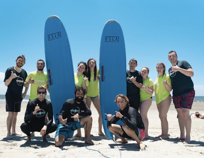 All smiles at Isla Surf School on Folly.