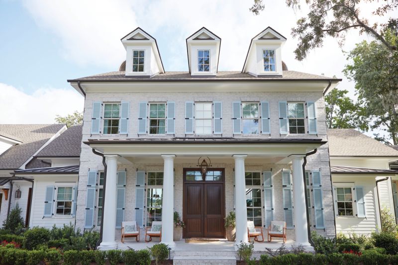 The 6,100-square-foot home on the banks of the Ashley River has five bedrooms, two playrooms, three laundry rooms, and a three-car garage with a workshop for David. A finished attic space functions as a workout room now but will be a great hangout for when the children become teens.